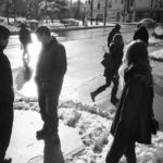 Members of the Agency Dominion team on the sidewalk in the winter time