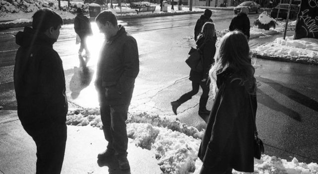 Members of the Agency Dominion team on the sidewalk in the winter time