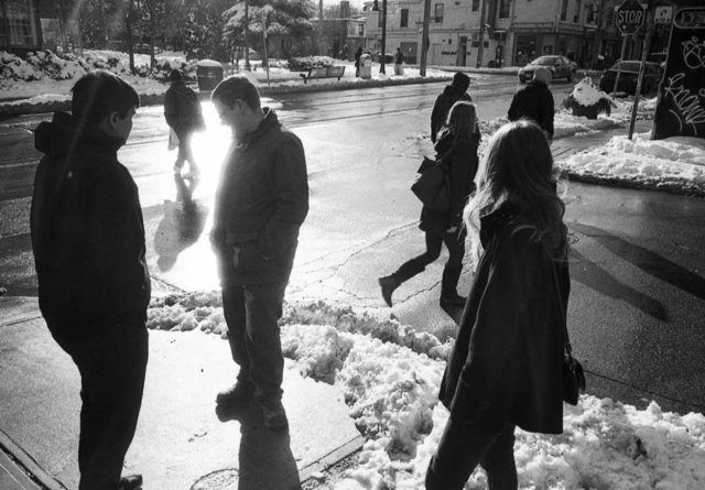 Members of the Agency Dominion team on the sidewalk in the winter time